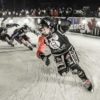 Scott Serfas/Red Bull Content Pool. Team Living The Dream compete against Hill Bombers during the Team Competition of the fourth stage of Red Bull Crashed Ice, the Ice Cross Downhill World Championship in Edmonton, Canada on March 13, 2015.