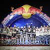 Balazs Gardi/Red Bull Content Pool. Hill Bombers (L) celebrate with Team Living the Dream (C) and The Bergy Brunch (R) during the Team Competition Award Ceremony of the fourth stage of Red Bull Crashed Ice, the Ice Cross Downhill World Championship in Edmonton, Canada on March 13, 2015.